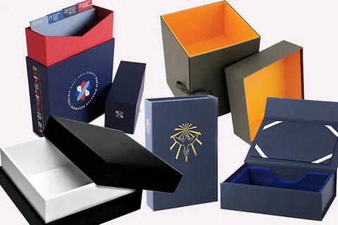 A variety of custom rigid boxes displayed in different sizes and designs.