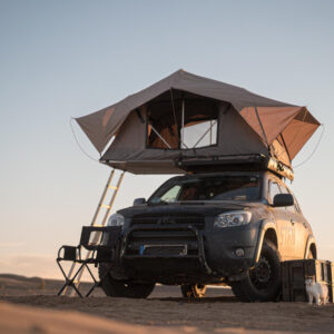 Parked SUV with a camping setup