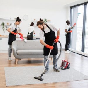 Cleaning team performing Apartment Clean Out Services Kent WA in a modern apartment using professional tools and techniques.