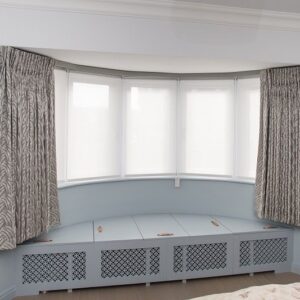 Roller blinds installed in a modern living room